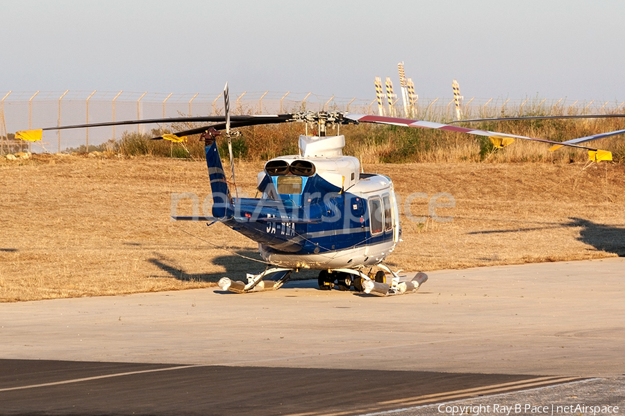 (Private) Agusta Bell AB-412 (5A-WMA) | Photo 336109