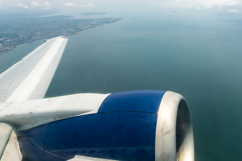 Transair (Senegal) Boeing 737-38J (6V-AJE) at  In Flight, Gabon