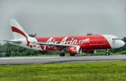 AirAsia Airbus A320-214 (9M-AFB) at  Adisumarmo International, Indonesia