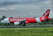 AirAsia Airbus A320-216 (9M-AHP) at  Adisumarmo International, Indonesia