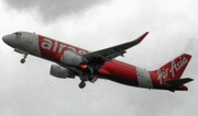 AirAsia Airbus A320-216 (9M-AJC) at  Adisumarmo International, Indonesia