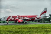 AirAsia Airbus A320-216 (9M-AJS) at  Adisumarmo International, Indonesia