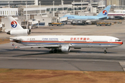 China Eastern Airlines McDonnell Douglas MD-11 (B-2174) at  Hong Kong - Kai Tak International (closed), Hong Kong