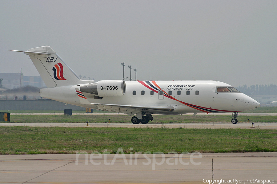 Shandong Airlines Rainbow Jet Bombardier CL-600-2B16 Challenger 604 (B-7696) | Photo 290232