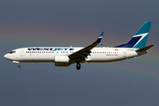 WestJet Boeing 737-8CT (C-FBWI) at  Calgary - International, Canada