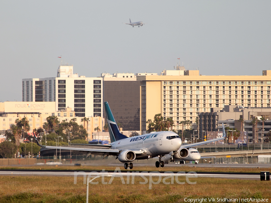 WestJet Boeing 737-7CT (C-FBWS) | Photo 156437