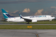 WestJet Boeing 737-8CT (C-FDMB) at  Calgary - International, Canada