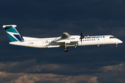 WestJet Encore Bombardier DHC-8-402Q (C-FIWE) at  Calgary - International, Canada