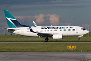WestJet Boeing 737-7CT (C-FKIW) at  Calgary - International, Canada