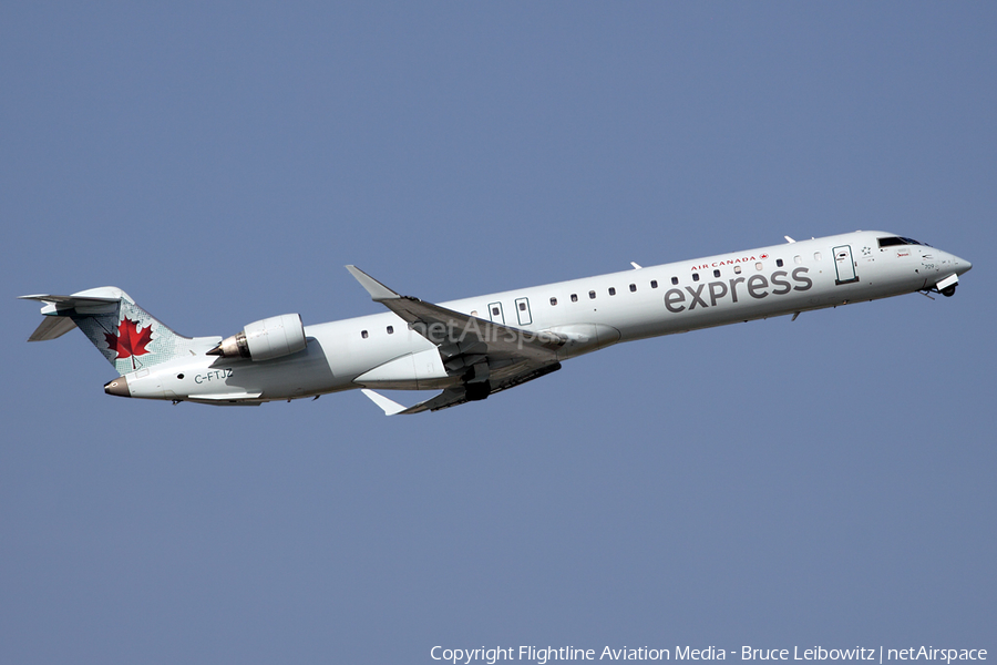 Air Canada Express (Jazz) Bombardier CRJ-705ER (C-FTJZ) | Photo 150394