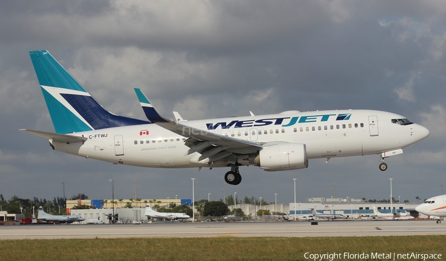 WestJet Boeing 737-7CT (C-FTWJ) | Photo 558923