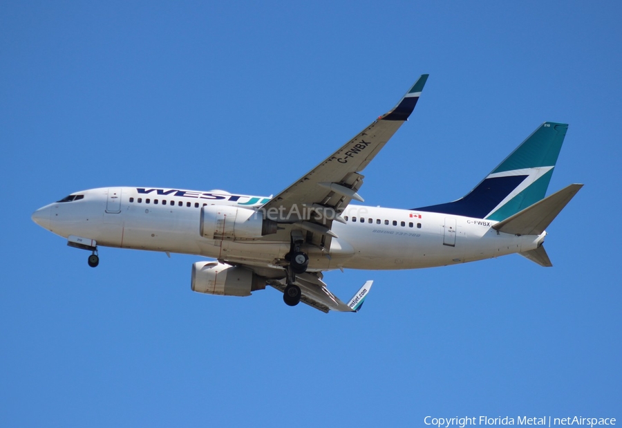 WestJet Boeing 737-7CT (C-FWBX) | Photo 559010