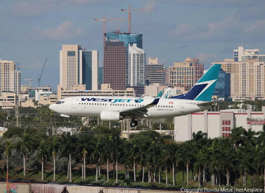 WestJet Boeing 737-7CT (C-FWCN) | Photo 309512