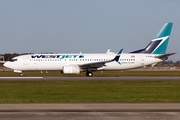 WestJet Boeing 737-8CT (C-FWIJ) at  Orlando - International (McCoy), United States