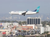 WestJet Boeing 737-8CT (C-FWJS) at  Los Angeles - International, United States