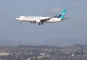 WestJet Boeing 737-8CT (C-FWJS) at  Los Angeles - International, United States