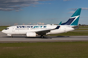 WestJet Boeing 737-7CT (C-FWSO) at  Calgary - International, Canada