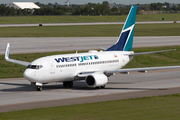 WestJet Boeing 737-7CT (C-FWSX) at  Calgary - International, Canada