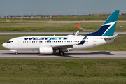 WestJet Boeing 737-7CT (C-FWSX) at  Calgary - International, Canada