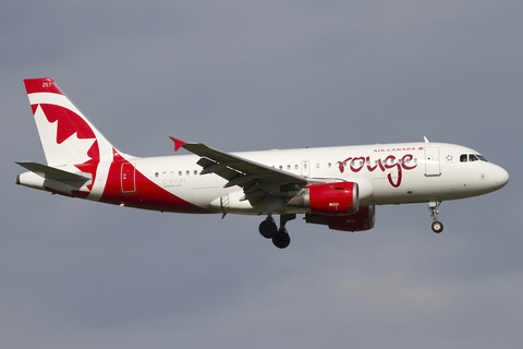 Air Canada Rouge Airbus A319-114 (C-FYJH) at  Calgary - International, Canada