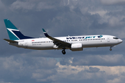 WestJet Boeing 737-8CT (C-FZRM) at  Calgary - International, Canada