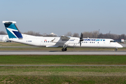 WestJet Encore Bombardier DHC-8-402Q (C-GENK) at  Montreal - Pierre Elliott Trudeau International (Dorval), Canada