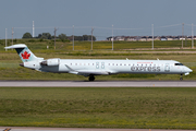 Air Canada Express (Jazz) Bombardier CRJ-705ER (C-GPJZ) at  Calgary - International, Canada