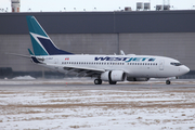 WestJet Boeing 737-7CT (C-GWJF) at  Montreal - Pierre Elliott Trudeau International (Dorval), Canada