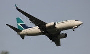 WestJet Boeing 737-7CT (C-GWSO) at  Orlando - International (McCoy), United States