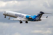 Nordica (Adria Airways) Bombardier CRJ-701ER (ES-ACE) at  Amsterdam - Schiphol, Netherlands