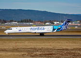 Nordica (Adria Airways) Bombardier CRJ-701ER (ES-ACE) at  Oslo - Gardermoen, Norway