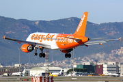 easyJet Airbus A319-111 (G-EZIO) at  Barcelona - El Prat, Spain
