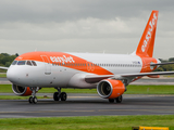 easyJet Airbus A320-214 (G-EZOU) at  Manchester - International (Ringway), United Kingdom