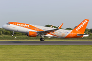 easyJet Airbus A320-214 (G-EZOX) at  Manchester - International (Ringway), United Kingdom