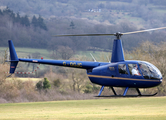 (Private) Robinson R44 Raven II (G-OGJC) at  Cheltenham Race Course, United Kingdom