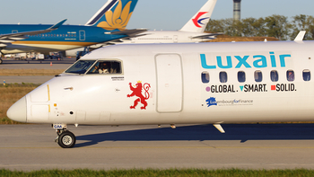 Luxair Bombardier DHC-8-402Q (LX-LGM) at  Paris - Charles de Gaulle (Roissy), France