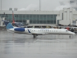 United Express (ExpressJet Airlines) Embraer ERJ-145XR (N12160) at  Denver - International, United States