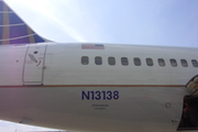 United Airlines Boeing 757-224 (N13138) at  Orlando - International (McCoy), United States