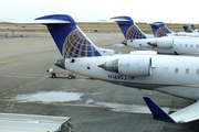 United Express (GoJet Airlines) Bombardier CRJ-702 (N161GJ) at  Denver - International, United States