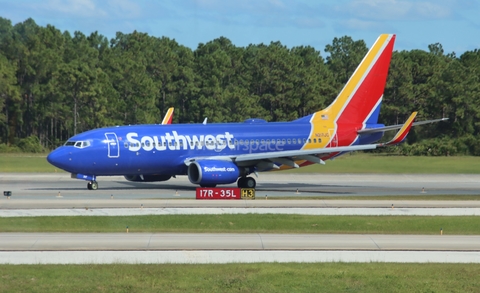Southwest Airlines Boeing 737-7H4 (N217JC) at  Orlando - International (McCoy), United States