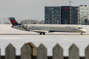Delta Connection (Pinnacle Airlines) Bombardier CRJ-900LR (N232PQ) at  Montreal - Pierre Elliott Trudeau International (Dorval), Canada