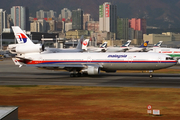 Malaysia Airlines McDonnell Douglas MD-11 (N271WA) at  Hong Kong - Kai Tak International (closed), Hong Kong
