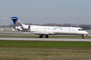 United Express (Mesa Airlines) Bombardier CRJ-701ER (N501MJ) at  Montreal - Pierre Elliott Trudeau International (Dorval), Canada