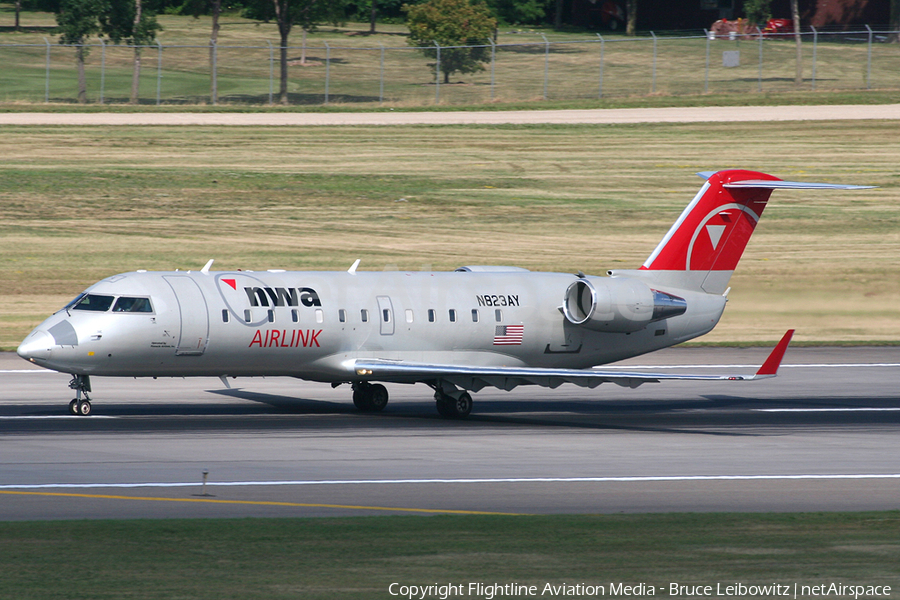 Northwest Airlink (Pinnacle Airlines) Bombardier CRJ-200LR (N823AY) | Photo 150739
