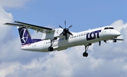 LOT Polish Airlines Bombardier DHC-8-402Q (OY-YBY) at  Warsaw - Frederic Chopin International, Poland