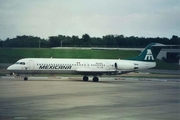 Mexicana Fokker 100 (PH-JXW) at  Orlando - International (McCoy), United States