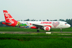 Indonesia AirAsia Airbus A320-216 (PK-AXU) at  Medan - Kualanamu International, Indonesia