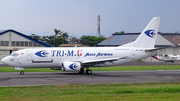 Tri-M.G Intra Asia Airlines Boeing 737-3G7(SF) (PK-YGV) at  Bandung - Husein Sastranegara International, Indonesia