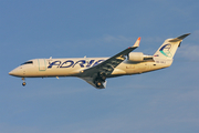 Adria Airways Bombardier CRJ-200ER (S5-AAJ) at  London - Gatwick, United Kingdom