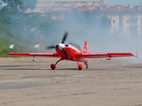 Zelazny Aerobatic Team Extra EA-300LC (SP-AUP) at  UNKNOWN, (None / Not specified)